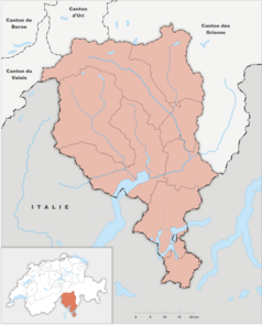 Mapa konturowa Ticino, na dole nieco na prawo znajduje się czarny trójkącik z opisem „Monte San Giorgio”