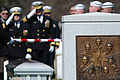 A casket team from the United States Navy fold the flag covering the remains of NASA Astronaut and U.S. Navy Captain Laurel Blair Salton Clark, a crew member of the Space Shuttle Columbia who perished with the rest of her crewmates during the Columbia disaster in 2003.