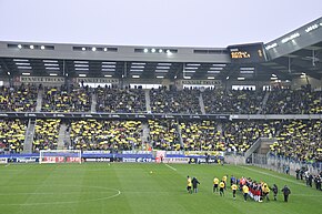 Photo de la présentation des équipes lors du match PSG-Quevilly en 2010.