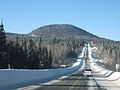 Route enneigée en hiver, Acadie, Nouveau-Brunswick.