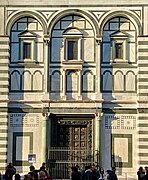 South facade of Baptistery with monumental windows similar to Pantheon aedicules