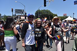 Allies wear shirts offering Mom or Dad hugs for LGBT people at pride.jpg