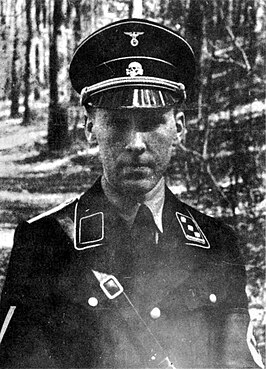 SS-Hauptsturmführer Bruno K. Schultz in het SS-Rasse und Siedlungshauptamt.