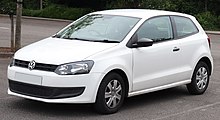 Front-three-quarter view of a small three-door car with a two-box body style fitted with door mirrors, body-coloured bumpers, flush headlamps, and hubcaps.