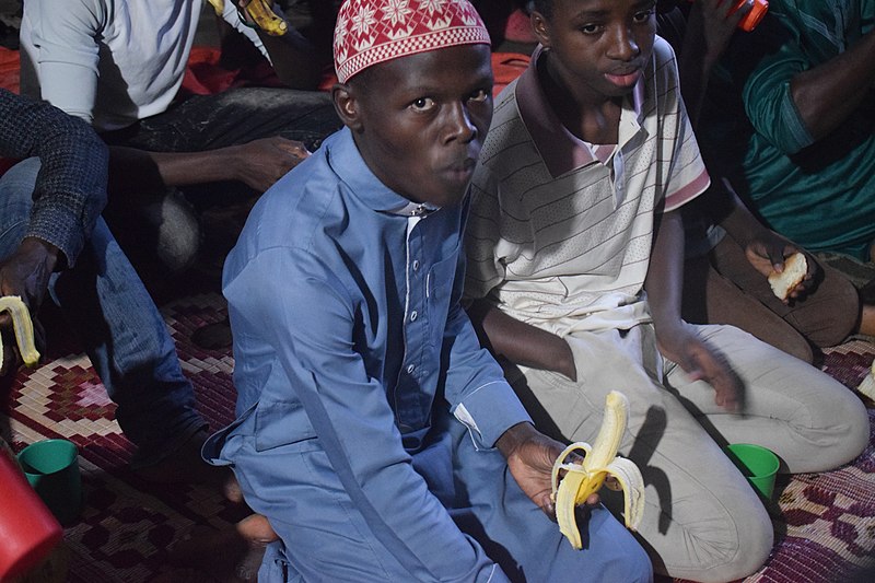 File:Muslims breaking fast.jpg