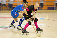 Kevin Karschau et Davide Motaran, capitaines respectifs des sélections d'Allemagne et d'Italie de rink hockey, lors d'une rencontre du Championnat d'Europe 2014 à Alcobendas (Communauté de Madrid