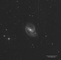 Image de NGC 1097 par le télescope Schmidt dans l'ultraviolet.