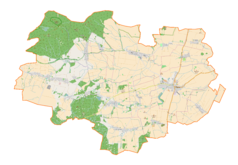 Mapa konturowa gminy Łagiewniki, po prawej nieco u góry znajduje się punkt z opisem „Dwór w Radzikowie”