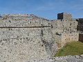 A torre de St. John na extremidade leste do setor inglês. A torre foi construída pelo Grão-Mestre Antonio Fluvian (1421-1437) e tinha um portão. Mais tarde, uma barbacã foi construída ao redor dela sob o comando do Grão-Mestre Piero Raimundo Zacosta (1461–1467). Finalmente, o grande baluarte pentagonal foi construído em frente a ela c. 1487, e o portão foi removido.