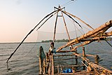 A4 Fishermen on the Chinese fishing nets of Cochin. Fisheries in India is a major industry in its coastal states, employing over 14 million people. The annual catch doubled between 1990 and 2010.