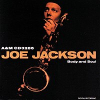 An orange-tinted photograph of Jackson holding a saxophone against a black background. The album title and artist's name are displayed in bold orange text on the right side, with the catalog number (AMLX 65000) positioned above the title.