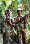 Sergeant of the Royal Bermuda Regiment (right) in No. 9 dress with a Jamaica Defence Force soldier.