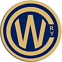 A blue circle with a large gold C encircling a gold W as the logo