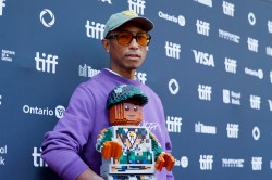 TORONTO, ONTARIO - SEPTEMBER 10: Pharrell Williams attends the premiere of "Piece by Piece" at Princess of Wales Theatre on September 10, 2024 in Toronto, Ontario.  (Photo by Jemal Countess/Getty Images)