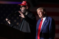 LAS VEGAS, NEVADA - SEPTEMBER 13: Recording artist Nicky Jam (L) speaks as Republican presidential nominee, former U.S. President Donald Trump, (R) looks on during a campaign rally at The Expo at World Market Center Las Vegas on September 13, 2024 in Las Vegas, Nevada. With 53 days before election day, Former President Trump continues to campaign.  (Photo by Justin Sullivan/Getty Images)