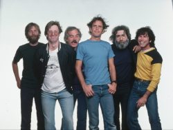 Members of the Grateful Dead are Phil Lesh (white T-shirt), Bob Weir (blue shirt), Mickey Hart (yellow shirt), Jerry Garcia (long hair and beard), Bill Kreutzmann (mustache) and Brent Mydland (black shirt and pants).  (Photo by © Roger Ressmeyer/CORBIS/VCG via Getty Images)