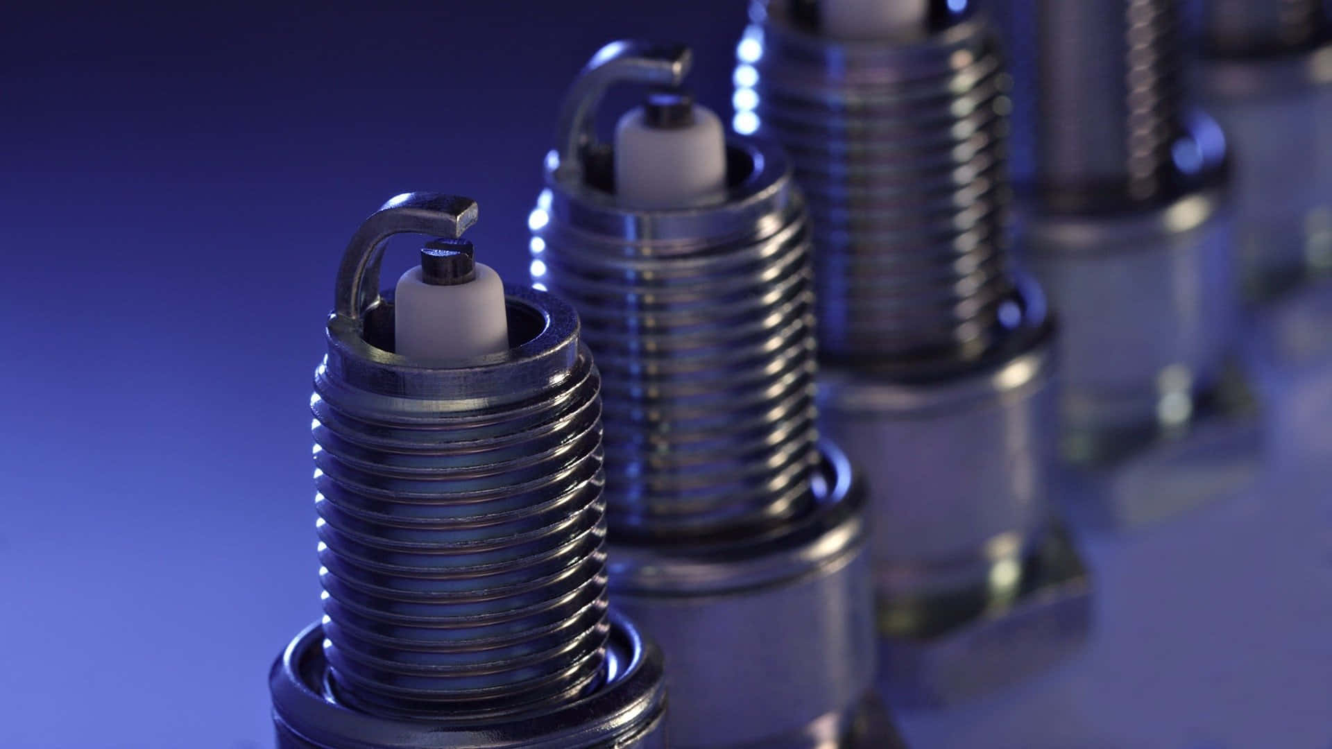 Metal Spark Plug Standing Formation Wallpaper