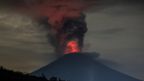 epa06353122 A long expossure photograph shows the Mount Agung volcano spewing hot volcanic ash as seen from Amed, Karangasem regency, Bali, Indonesia, 26 November 2017