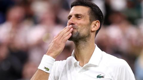 Novak Djokovic blows kisses to the crowd