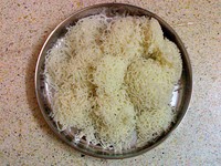 Puttu, with sea food at a shop in Jaffna.