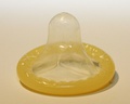 A rolled up male condom.