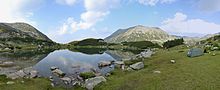 A glacial lake and a mountain summit