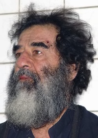 Saddam Hussein shortly after capture by American forces, and after being shaved to confirm his identity