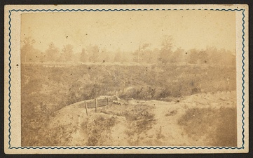 Photograph of the earthworks and one of the deep, forested ravines that defended Port Hudson, 1863–1864, Library of Congress collection.