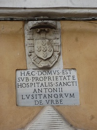 Portuguese coat of arms and sign – commending the property and hospital to Anthony of Lisbon – outside the Church of Sant'Antonio dei Portoghesi, Rome; the Portuguese presence in Europe outside of Portugal, has had many reasons such as economic, cultural and religious (up). Santa Cruz Church, Thon Buri District, Bangkok, Constructed by Portuguese monks in the 18th Century (down)