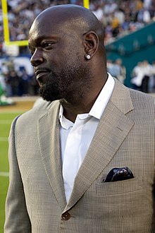 Emmitt Smith in a suit.