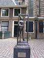 Bronze statue Belle in front of the Oude Kerk. Inscription says "Respect sex workers all over the world."