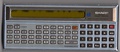 Sharp PC-1211. This example exhibits a display that is failing, a very common problem with Sharp's displays of the time.