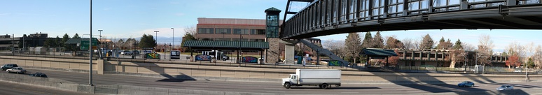  A panorama of the Orchard RTD station (located in Greenwood Village) as viewed from the east side of Interstate 25. The view includes part of the pedestrian bridge that provides access to the other side of the freeway from the station.