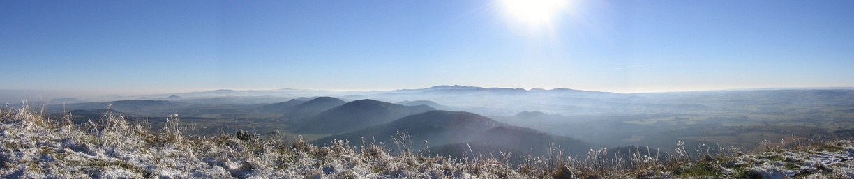  Panorama of the Chaîne des Puys from Puy de Dôme in winter. Massif Central, France. An example of how past volcanic activity shaped a landscape