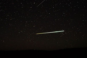 Sporadic bolide over the desert of Central Australia and a Lyrid (top edge)