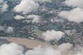 Left: MV Star Amber at the lock gate of Netaji Subhas Dock (NSD). Center: Aerial View of Netaji Subhas Dock and Hooghly River. Right:MV Kota Rakyat unloading containers at the Netaji Subhash Dock of Kolkata Dock System.