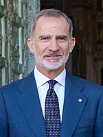 Two contemporary heads of state who are constitutional monarchs, but with no political power: King Norodom Sihamoni of Cambodia (left), and King Felipe VI of Spain (right).