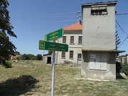 Left: Bilingual street sign in Croatian and Serbian in DaljRight: Graffiti during anti-Cyrillic protests