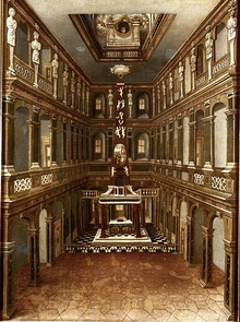 Painting of the interior of the church Schloßkirche, viewed along the nave towards the altar, showing two balconies and the organ on a third level above the altar