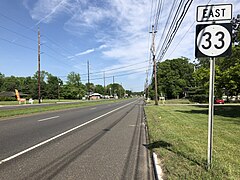 Nassau County on Long Island, New York (above) is emblematic of the continuous sprawl making up the inner suburbs of New York City, in contrast with Monroe Township, Middlesex County, New Jersey (below), characteristic of an outer suburb, or exurb, of New York City, with a lower population density.