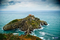 Downhill Strand, County Londonderry was used to represent a beach of the island of Dragonstone (left) and Gaztelugatxe in the Basque Country, Spain (right) stood in for Dragonstone in Season 7.