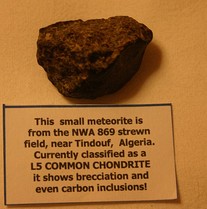 Meteorite with brecciation and carbon inclusions from Tindouf, Algeria[80]