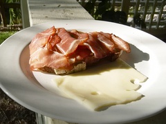 Westphalian ham atop bread, with cheese