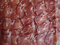 A piece of Coppa Spécialité Corse (Corsica): a balanced quantity of white fat is important for flavour and tenderness.