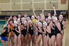 Left: A U.S. high school girls' water polo team (with their male coaches in background) posing with their trophy. Right: A U.S. university girl practising a difficult gymnastics manoeuvre under the watchful eyes of her coach.