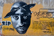 These graffiti arts are a tribute to East and West Coast rappers the Notorious B.I.G. and Tupac Shakur, both of whom were killed in (separate) drive-by shootings.