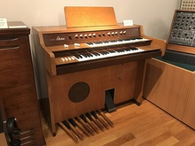 A Typical Spinet organ (Hammond TR-200)  has two short manuals arranged with offset. Spinet organ's pedalboard spanned only a single octave.