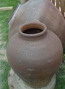 Traditional tapayan jar, used as a lawn ornament, water jar, or for bread baking, from the Philippines