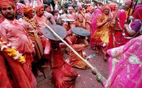 In the Braj region of North India, women have the option to playfully hit men who save themselves with shields; for the day, men are culturally expected to accept whatever women dish out to them. This ritual is called Lath Mar Holi.[95]