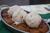 A cookie dessert, topped with ice cream